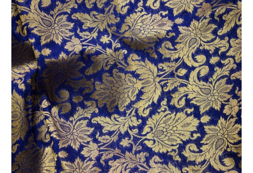 Indian Blended Silk Navy Blue Brocade By The Yard Headband Material Banarasi Jacket Midi Dress Golden Floral Motifs Design gown Hat Making Home Furnishing festive wear Skirts Fabric