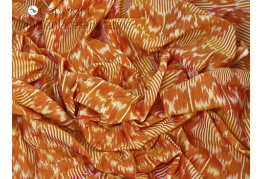 Indian orange ikat cotton fabric by the yard homespun handloom quilting crafting women kids summer dresses cushions home decor draperies curtains clutches making soft fabric