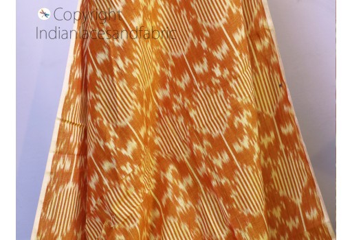 Indian orange ikat cotton fabric by the yard homespun handloom quilting crafting women kids summer dresses cushions home decor draperies curtains clutches making soft fabric
