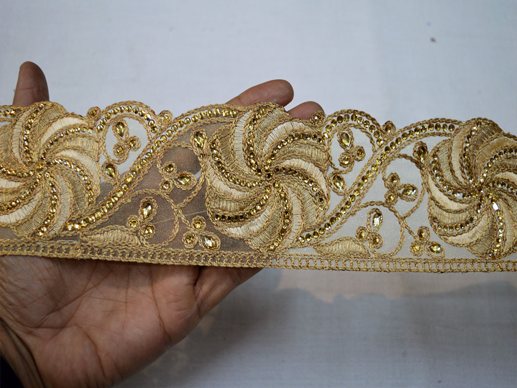 Use our Kundan beaded laces and other embellishments for designing